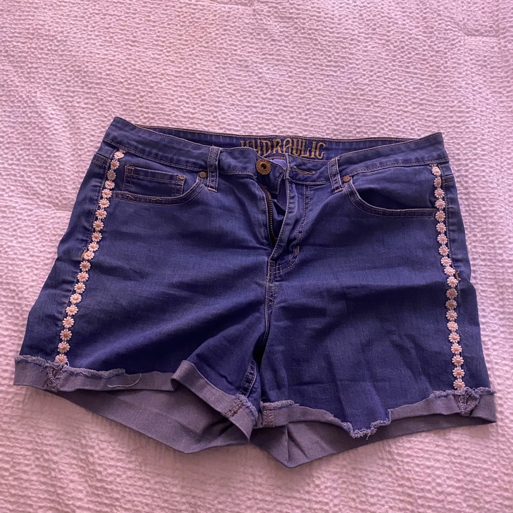 Fold over Jean shorts with daisy lining on the side